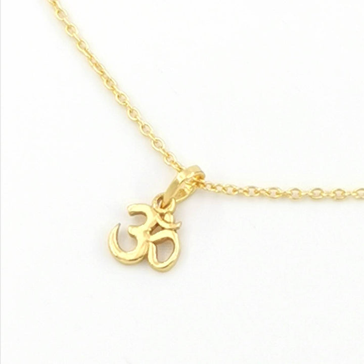 Tiny Om Charm— 18k Gold Plated