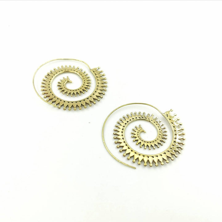 Boho Spiral Earrings with Sun Pattern — Brass