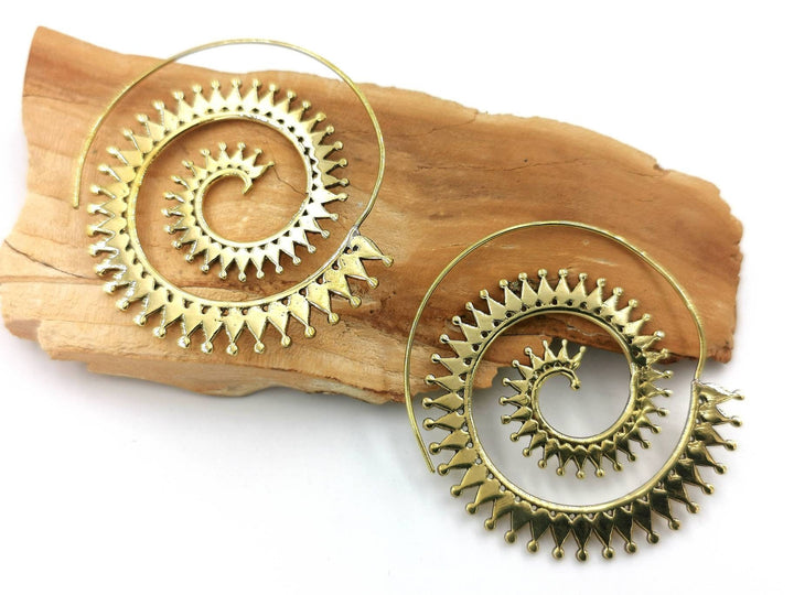 Boho Spiral Earrings with Sun Pattern — Brass