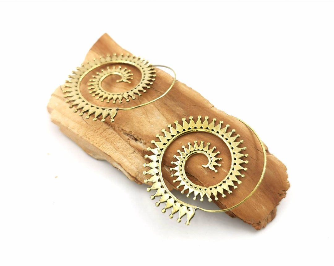 Boho Spiral Earrings with Sun Pattern — Brass