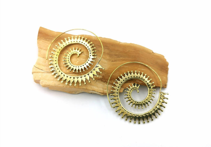 Boho Spiral Earrings with Sun Pattern — Brass