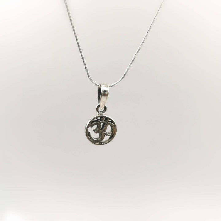 Tiny Circular Om Charm — 925 Silver