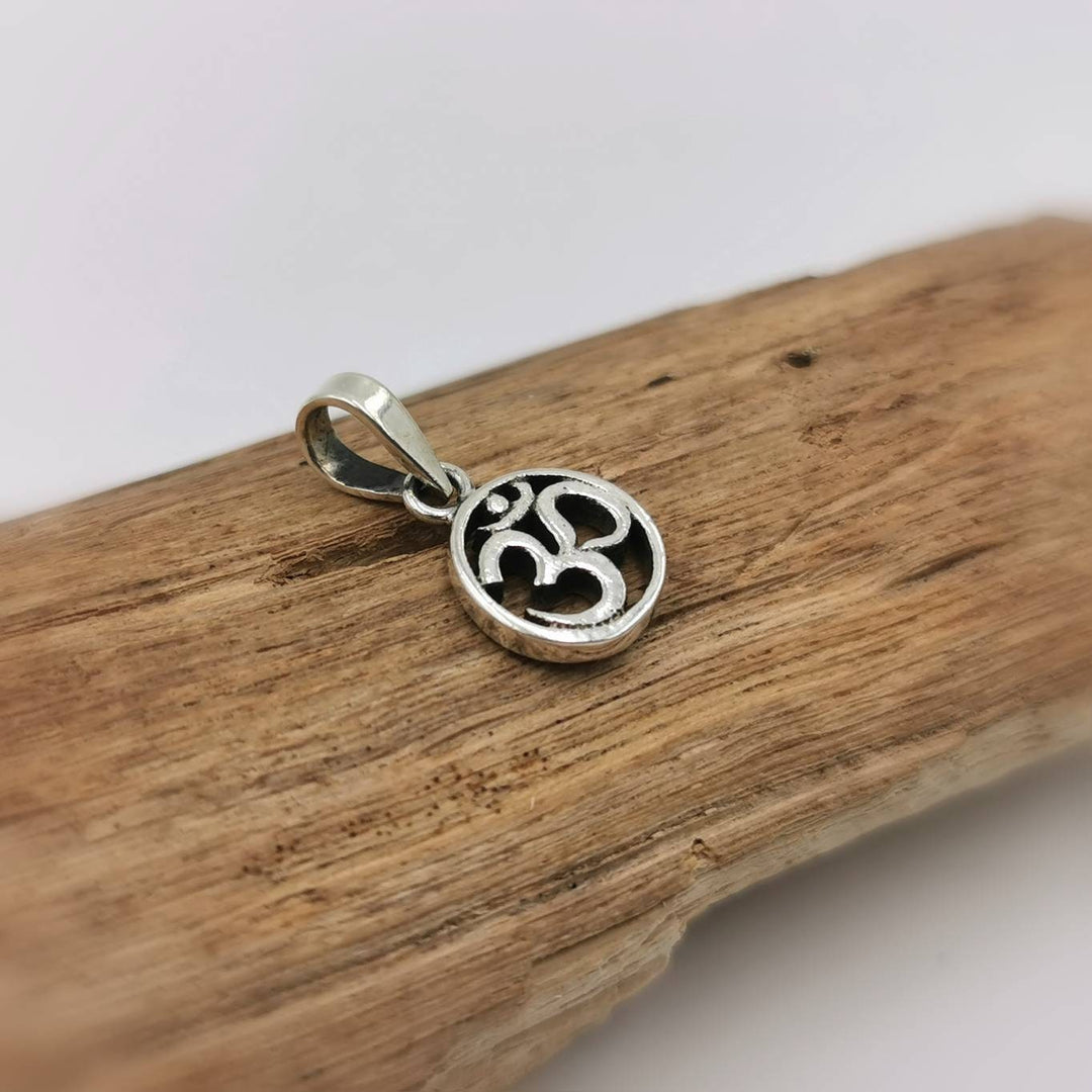 Tiny Circular Om Charm — 925 Silver
