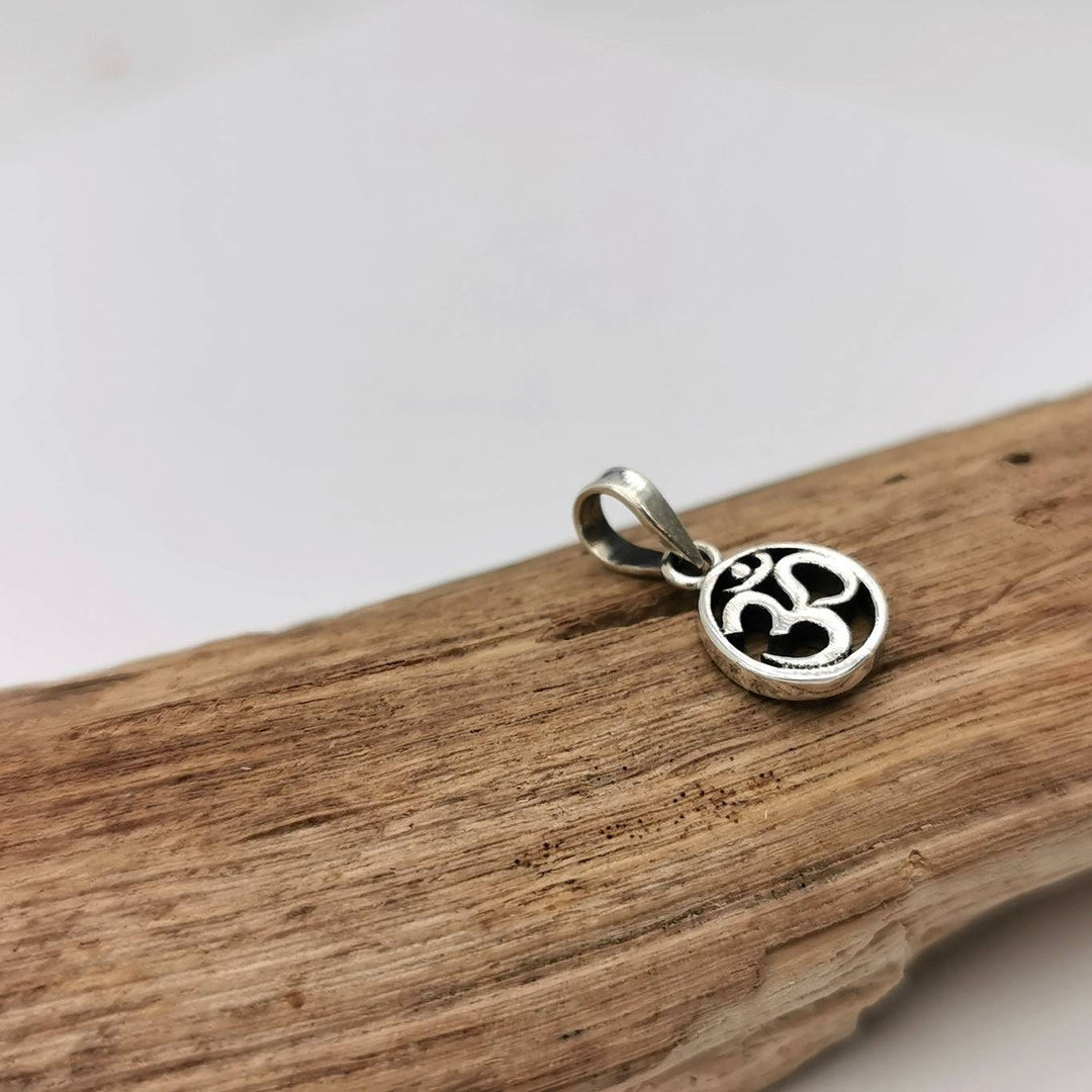Tiny Circular Om Charm — 925 Silver